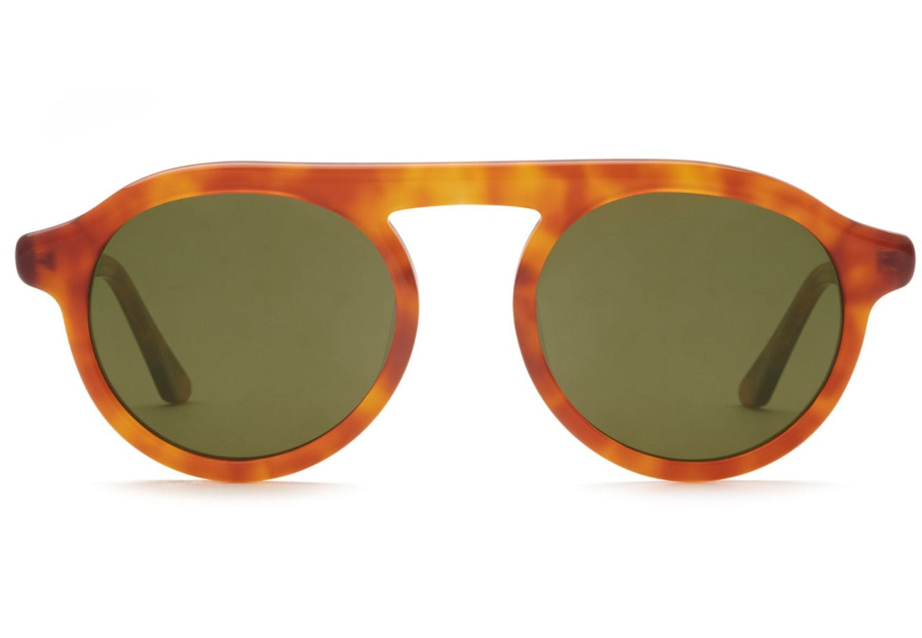 Krewe Cameron sunglasses with green, round lenses on a white background, featuring UVA and UVB protection.