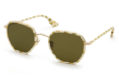 Krewe Pascal Sunglasses boast a hexagonal design with green tinted lenses, enhanced by a chic gold-patterned finish and an acetate and stainless steel frame. They provide 100% UVA and UVB protection for your eyes.