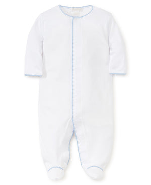 Kissy Kissy Premier Basics Footie with white baby footie onesie with blue stitching along the edges and a blue vertical line down the front, displayed on a white background.