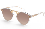 A pair of Krewe STL Nylon Sunglasses with brown lenses.