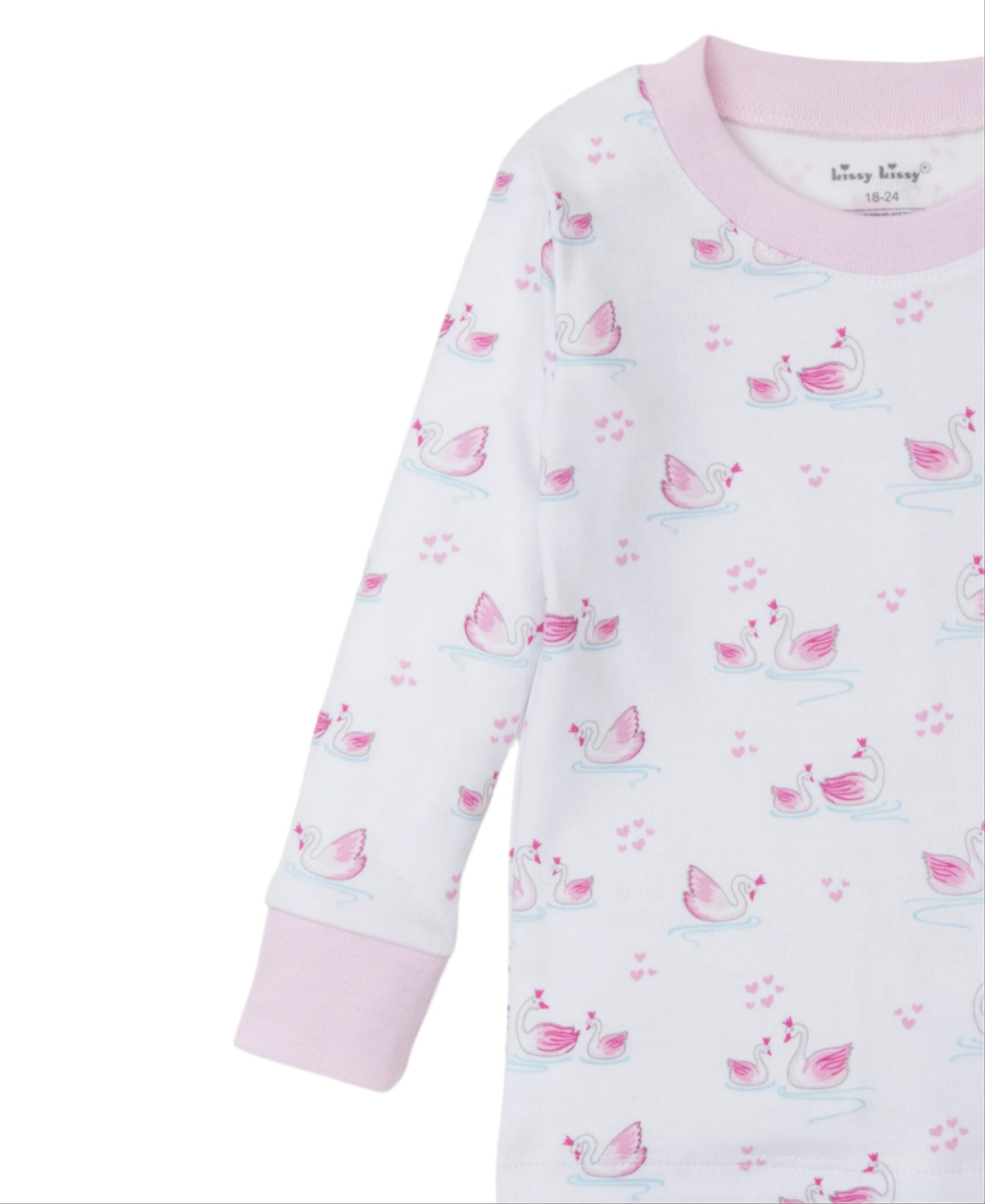 The Kissy Kissy Baby Girls' Swan Sanctuary Pajama Set features a white long-sleeve top with pink cuffs, decorated with charming pink swans and hearts. Made from luxury Pima cotton, it's ideal for cozy comfort and sweet dreams.