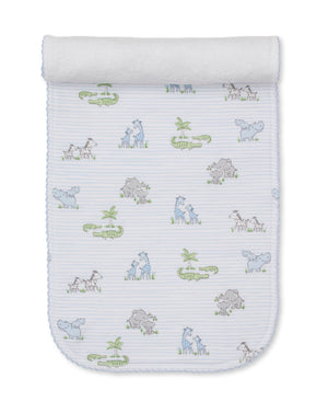 The Safari Party Burp Cloth by Kissy Kissy is a white baby burp cloth crafted from soft Pima cotton, featuring a light blue stripe design and an adorable animal pattern with giraffes, hippos, zebras, crocodiles, and palm trees.