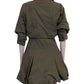 A person wearing the Simkhai Effie Bubble Mini Dress is photographed from the back against a plain light background.