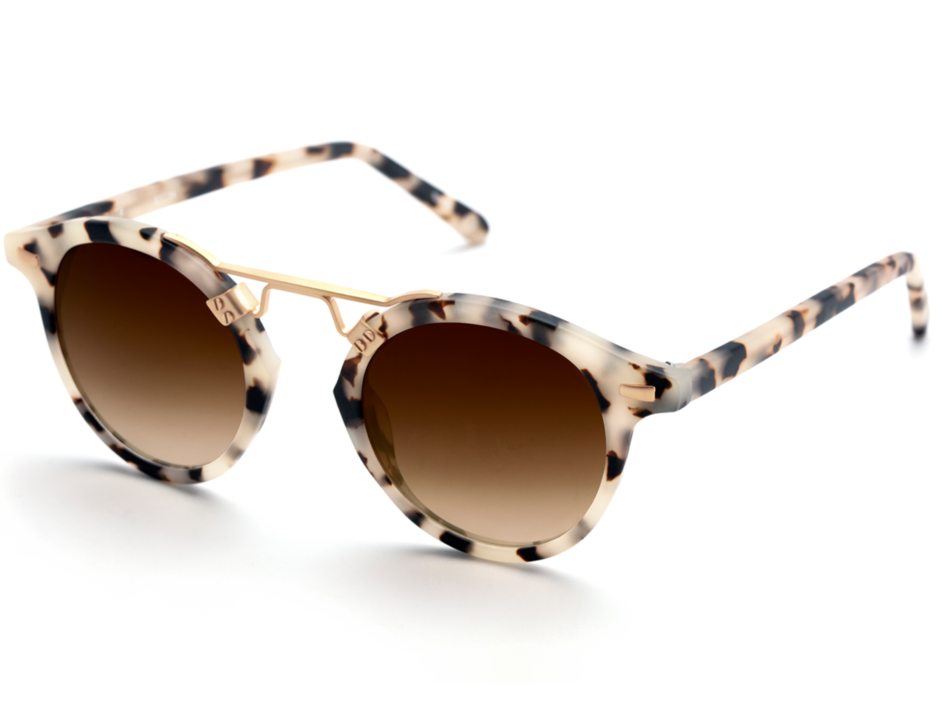 The Krewe St Louis sunglasses by Krewe boast a tortoise-shell pattern with a handcrafted frame, featuring 24K gold-plated accents and brown gradient lenses, beautifully displayed on a white background.