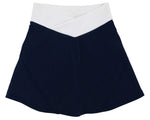 Inspired by classic style from The Beaufort Bonnet Company, the Girls’ Prepletic™ Katey Cross Skort features a navy blue color with a wide white waistband and angular design. Its slight flare and clean, simple lines combine timeless elegance with the comfort of a performance skort.