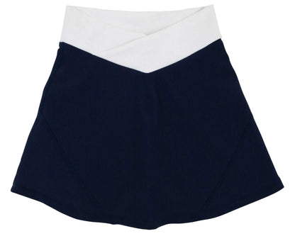 Inspired by classic style from The Beaufort Bonnet Company, the Girls’ Prepletic™ Katey Cross Skort features a navy blue color with a wide white waistband and angular design. Its slight flare and clean, simple lines combine timeless elegance with the comfort of a performance skort.