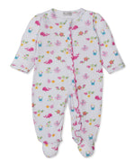 The Kissy Kissy Baby Girls' Ocean Antics Zip Ruffle Footie features colorful ocean-themed prints of pink crabs, sea turtles, and fish on a soft white Pima cotton fabric, and is designed with a convenient zipper closure and ruffle detailing.