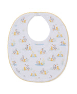 The Duck Pond Paddles Bib by Kissy Kissy is a white baby bib with yellow scalloped trim, crafted from the softest Pima cotton for ultimate comfort and adorned with a playful duck and duckling print among grass and water scenes.