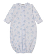 The Kissy Kissy Baby Sweet Sheep Convertible Gown is crafted from soft white Pima cotton and features long sleeves, blue scalloped trim, and a charming blue sheep print. Designed for comfort with elasticized bottoms and sleeves, this cozy gown is shown laid flat on a white background.