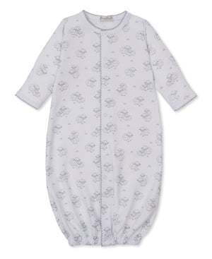 The Kissy Kissy Baby Sweet Sheep Convertible Gown features long sleeves, a white Pima cotton fabric with a gray sheep print, elasticized cuffs at the feet, front snap buttons, and scalloped trim at the sleeves.