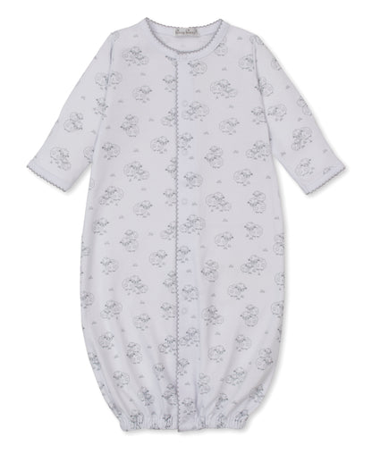 The Kissy Kissy Baby Sweet Sheep Convertible Gown features long sleeves, a white Pima cotton fabric with a gray sheep print, elasticized cuffs at the feet, front snap buttons, and scalloped trim at the sleeves.