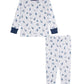 The Boys’ Space Race Pajama Set by Kissy Kissy features a white, long-sleeve top and pants with blue cuffs and collar, adorned with a playful pattern of small blue rockets. Made from ultra-soft Pima cotton, these toddler pajamas offer cozy comfort and out-of-this-world style for little dreamers eager to join the space race.