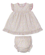 The Kissy Kissy Baby Girls' Garden Trellis Woven Dress Set features a Pima cotton dress with floral patterns, ruffled sleeves, and matching bloomers on a light background.