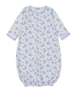 The Kissy Kissy Baby Whale Pods Convertible Gown, crafted from light blue Pima cotton and adorned with a charming whale pods print featuring blue whales and fish, showcases long sleeves and elasticized bottom and cuffs, displayed flat on a white background.