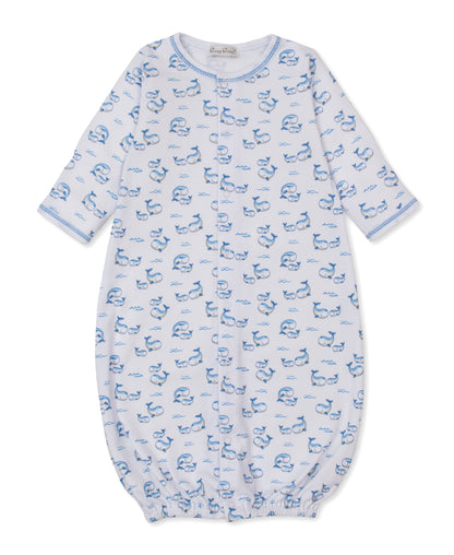 The Kissy Kissy Baby Whale Pods Convertible Gown, crafted from light blue Pima cotton and adorned with a charming whale pods print featuring blue whales and fish, showcases long sleeves and elasticized bottom and cuffs, displayed flat on a white background.