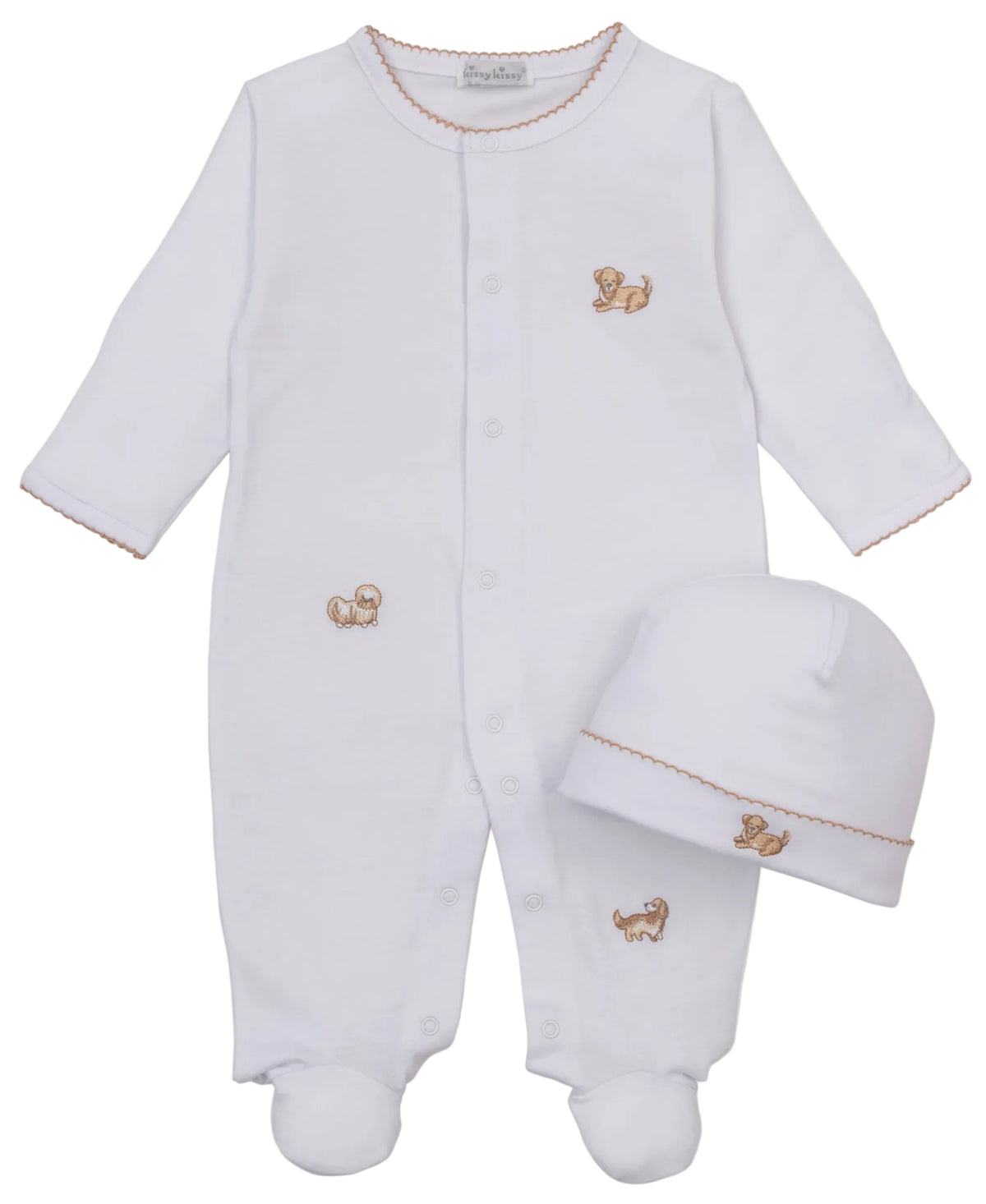 The Kissy Kissy Baby Puppy Paws Footie & Hat Set showcases a charming white infant footie and matching hat, both made from soft Pima cotton and adorned with small embroidered tan puppies and delicate brown stitching accents.