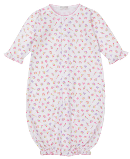 The Kissy Kissy Baby Girls' Sea Shell Magic Convertible Gown is a white Pima cotton romper with pink trim, decorated with sea shell, starfish, and crab prints in pink, yellow, and purple.
