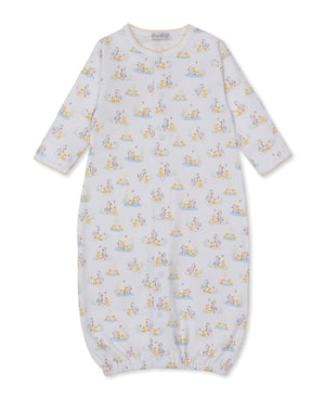 The Kissy Kissy Baby Duck Pond Paddles Convertible Gown is crafted from ultra-soft Pima cotton and features a playful pastel animal print on a white background. Designed for your baby's comfort, this long-sleeve gown includes an elastic hem and convenient snap buttons down the front.