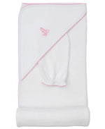The Kissy Kissy Giraffe Grace Hooded Towel & Mitt Set in white features pink trim and an embroidered pink giraffe, shown folded with the hood and matching mitt—ideal for baby bathtime.