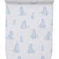 The Kissy Kissy Giraffe Grace Burp Cloth is crafted from soft Pima cotton and adorned with blue giraffe prints and scalloped edges, rolled at the top.