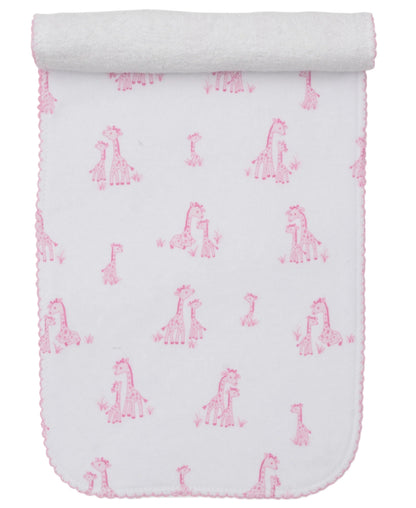The Kissy Kissy Giraffe Grace Burp Cloth features white Pima cotton with pink giraffe prints and scalloped edges, rolled at the top.