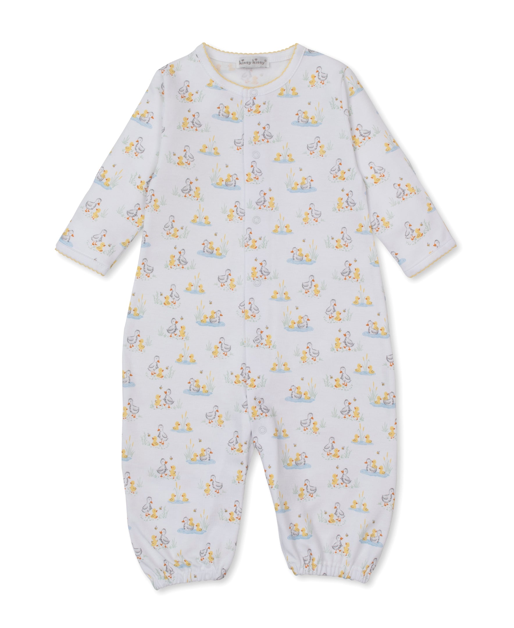 The Kissy Kissy Baby Duck Pond Paddles Convertible Gown is a long-sleeve, full-length romper featuring charming duck and animal prints on white Pima cotton fabric, designed for comfort and convenience with snap closures down the front.