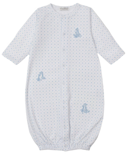 The Kissy Kissy Baby' Giraffe Grace Dotted Convertible Gown is a white Pima cotton gown with blue polka dots, giraffe prints, long sleeves, elastic hems, and front snaps for easy changes.
