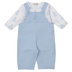 The Kissy Kissy Baby' Giraffe Grace Overall Set includes light blue overalls with snaps and a white long-sleeve pima cotton bodysuit adorned with cute light blue animal prints for a cozy, charming look.