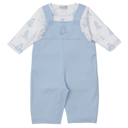 The Kissy Kissy Baby' Giraffe Grace Overall Set includes light blue overalls with snaps and a white long-sleeve pima cotton bodysuit adorned with cute light blue animal prints for a cozy, charming look.