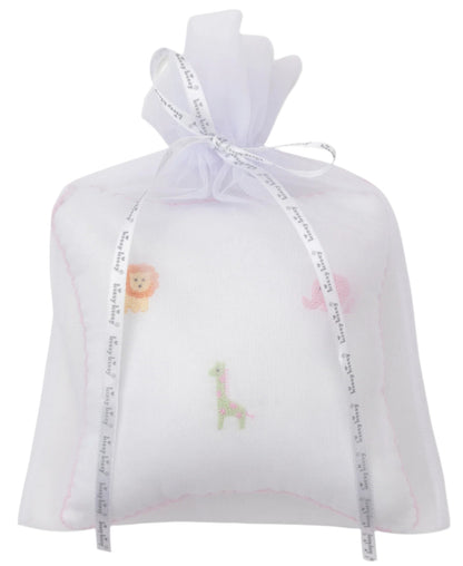 The Kissy Kissy Safari Wild Musical Pillow comes in a white tulle gift bag adorned with embroidered safari animals—lion, giraffe, and elephant—making it a charming present for baby essentials.
