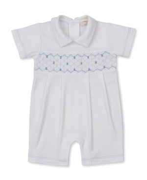 The Kissy Kissy Baby Boys’ Short Playsuit features short sleeves, a collar, and delicate blue smocking detail across the chest. Crafted from soft Pima cotton for superior comfort, this hand-smocked romper is displayed against a plain white background.
