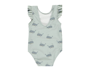 The Rylee & Cru Baby Girls' & Girls' Scoop Back Onepiece is a light green swimsuit with ruffled sleeves, a playful blue whale pattern, and UPF 50+ sun protection.