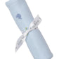 The Kissy Kissy Safari Wild Striped Blanket w/ Hand Emb is a light blue striped Pima cotton baby blanket, rolled and tied with a white ribbon printed with "Kissy Kissy" in gray.