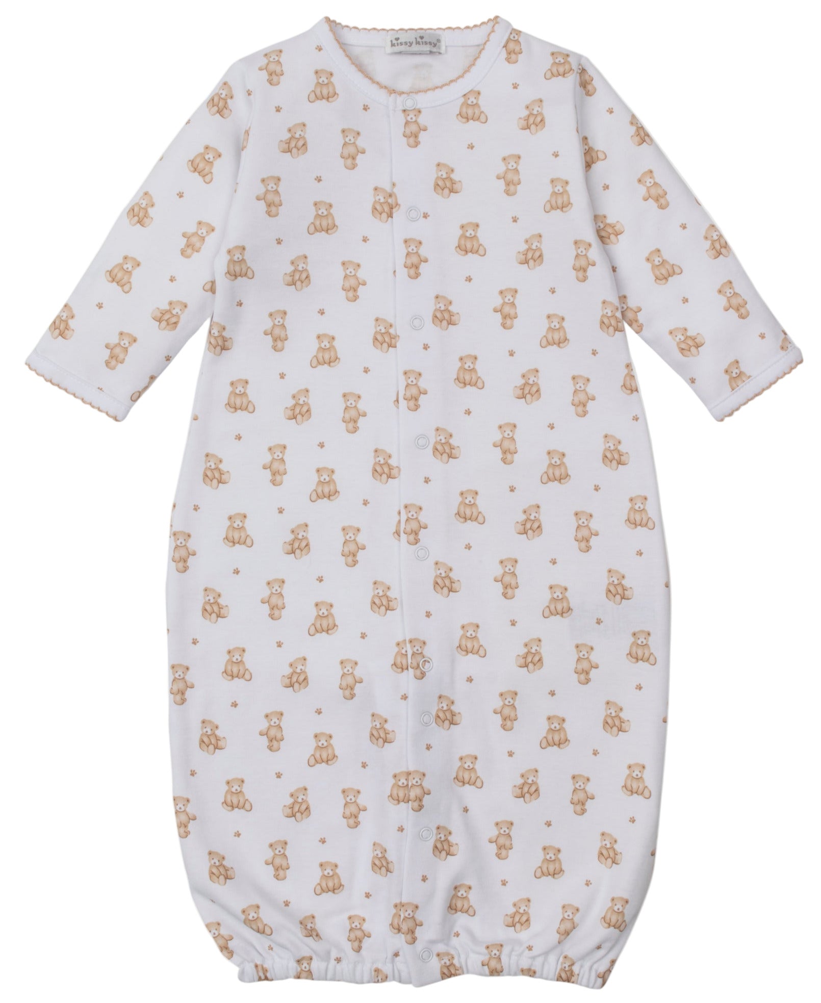 The Kissy Kissy Baby Teddy Bear Time Convertible Gown features soft white Pima cotton, long sleeves, a button front, an all-over teddy bear print, and an elastic bottom hem for comfort.