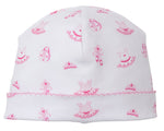 The Ready to Dance Hat by Kissy Kissy is a white Pima cotton baby hat with pink trim, featuring ballet-themed prints like dresses, ballerina shoes, tiaras, and purses—perfect for your little girl.