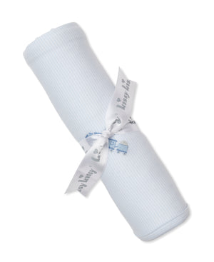 A rolled-up, light blue Fall Medley Striped Blanket with Hand Emb. by Kissy Kissy, made from Pima cotton and tied with a white ribbon featuring gray printed text.