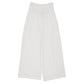 The Beaufort Bonnet Company Girls’ Lenai Lounge Pant in Worth Avenue White linen, featuring a wide-leg silhouette and elastic waistband, displayed flat on a white background.