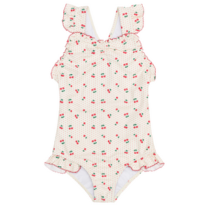 The Minnow Girls' Summer Cherries Ruffle Edge One Piece features a cream base with red and green cherry print, ruffled shoulder straps, and playful ruffle trim—perfect for girls' summertime swim adventures.