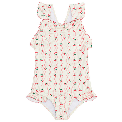 The Minnow Girls' Summer Cherries Ruffle Edge One Piece features a cream base with red and green cherry print, ruffled shoulder straps, and playful ruffle trim—perfect for girls' summertime swim adventures.