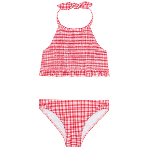 The Minnow Girls' Malibu Poppy Gingham Smocked Halter Bikini features red and white gingham, smocked halter top with ruffled hem, and matching bottoms.