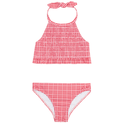 The Minnow Girls' Malibu Poppy Gingham Smocked Halter Bikini features red and white gingham, smocked halter top with ruffled hem, and matching bottoms.