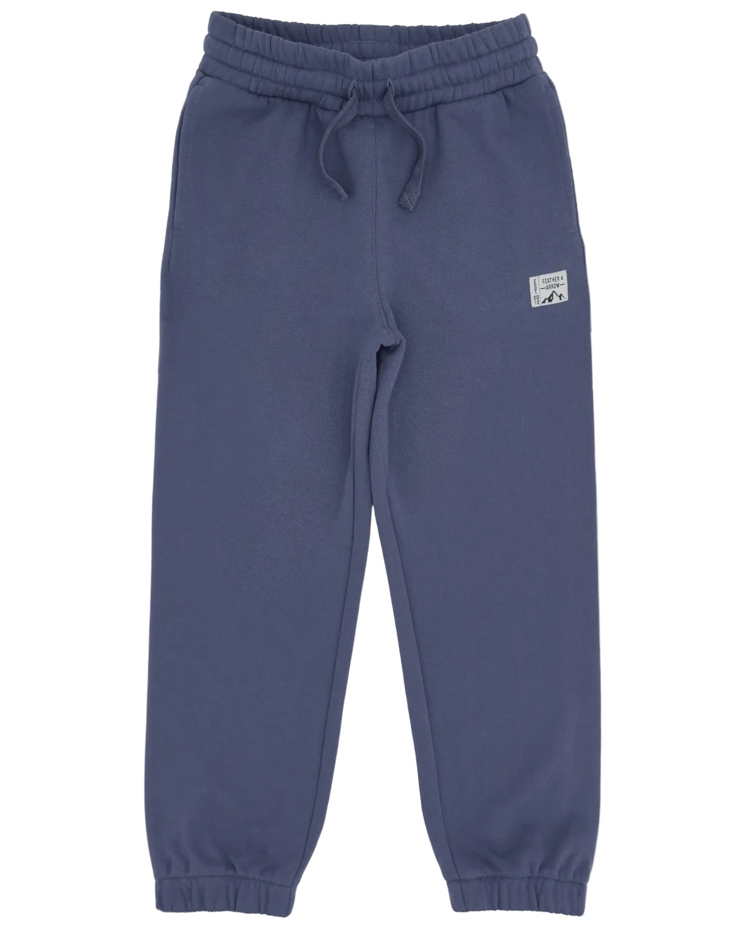 The Feather 4 Arrow Boys’ Wyatt Jogger features a dark blue color, an elastic adjustable waistband with a drawstring, and elastic cuffs. Designed for everyday comfort, these sweatpants include a small rectangular patch sewn near the left pocket.