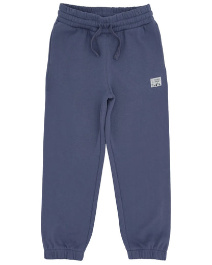 The Feather 4 Arrow Boys’ Wyatt Jogger features a dark blue color, an elastic adjustable waistband with a drawstring, and elastic cuffs. Designed for everyday comfort, these sweatpants include a small rectangular patch sewn near the left pocket.
