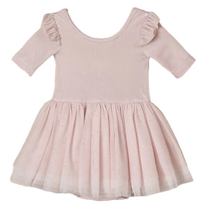 The Noralee Baby Girls’ and Girls’ Thea Tutu features a light pink, ballet-inspired design with short ruffled sleeves and a flared tulle skirt adorned with subtle sparkles, shown on a white background.
