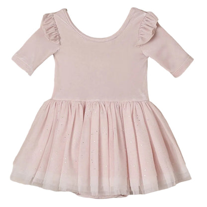 The Noralee Baby Girls’ and Girls’ Thea Tutu features a light pink, ballet-inspired design with short ruffled sleeves and a flared tulle skirt adorned with subtle sparkles, shown on a white background.