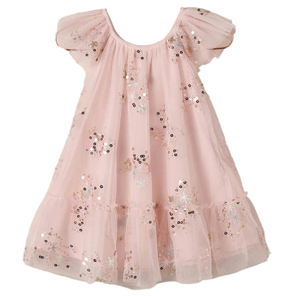 The Noralee Girls’ Edie Dress showcases a light pink hue with short sleeves, a flared skirt, and a gathered neckline. Sparkling sequins and embroidered star patterns adorn the tulle sleeves and lower skirt, while sheer fabric accents create an enchanting finish.