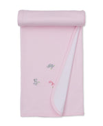 The Kissy Kissy SCE Safari Party Striped Blanket is a light pink Pima cotton blanket featuring small embroidered animals—an elephant, giraffe, and dog. Shown partially rolled to reveal the soft white underside, it offers cozy comfort your little one will love.