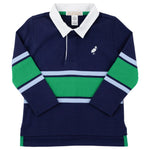 The Boys’ Rollins Rugby Shirt by The Beaufort Bonnet Company features a navy blue color with green and light blue stripes, crafted from soft Pima cotton, and is finished with a white collar and a small bird logo on the left chest.