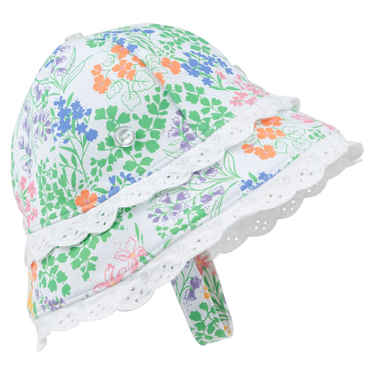 Introducing the Beaufort Swim Bucket Hat from The Beaufort Bonnet Company—a sun-ready accessory perfect for bright days. Featuring a vibrant floral pattern with colorful orange, purple, and green flowers on a white background, delicate white lace trim, and a secure chin strap. Crafted from swim-ready nylon spandex for comfort and durability.