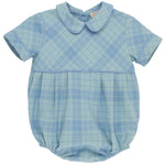 The Beaufort Bonnet Company Baby Boys’ Bradford Bubble is a light blue, short-sleeve romper featuring a Peter Pan collar and blue plaid pattern. This charming piece includes delicate piping details and an elasticized bottom for a timeless look inspired by classic style.